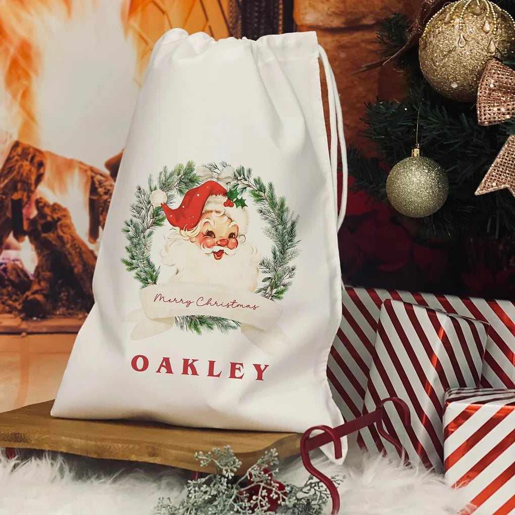Personalised Christmas Eve Bag. Santa wreath design
