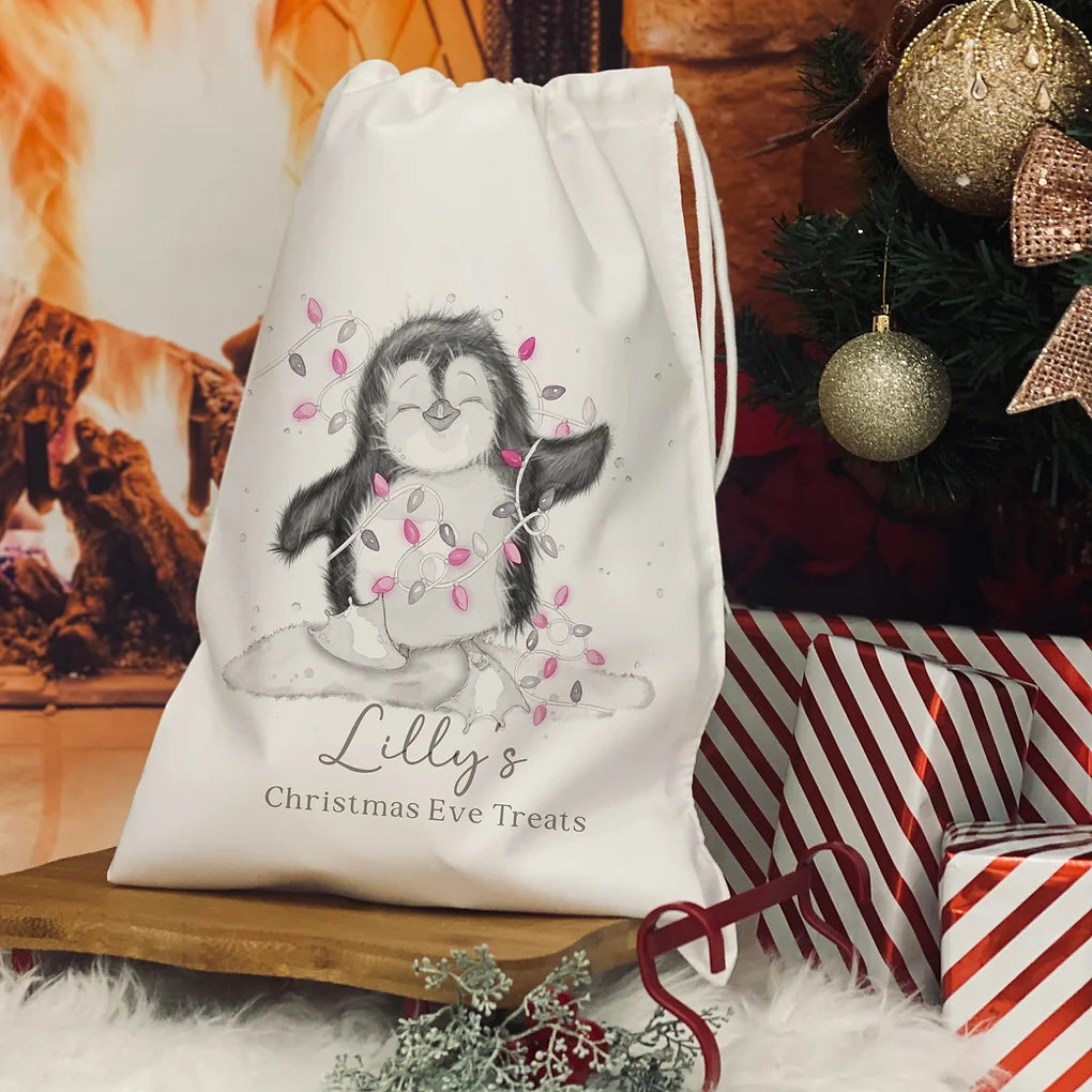 Personalised Christmas Eve Bag. christmas penguin pink lights design