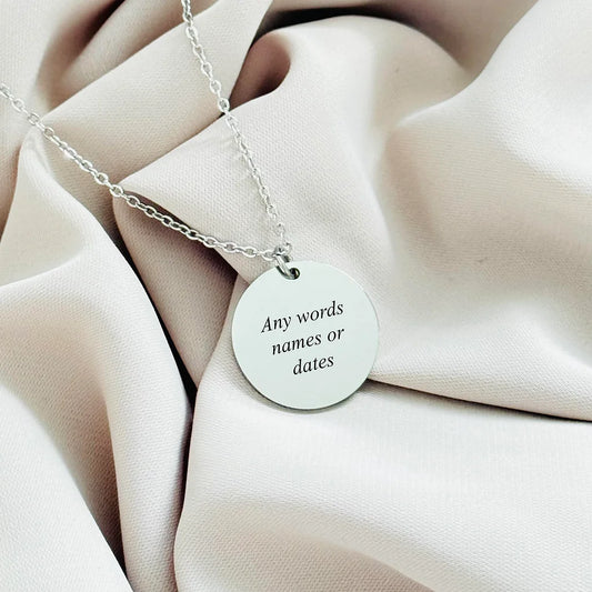 Personalised disk necklace.