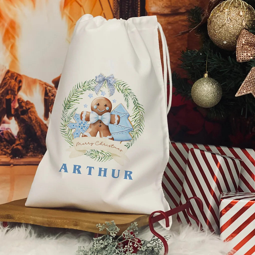 Personalised Christmas Eve Bag. Blue Ginger bread wreath christmas design