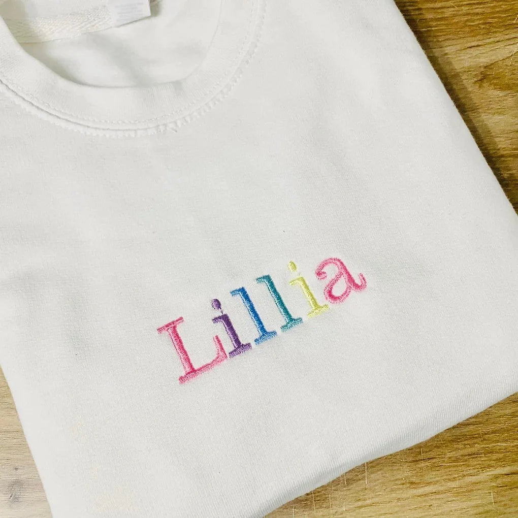 White Block Style text  Embroidered Sweater - Pastels