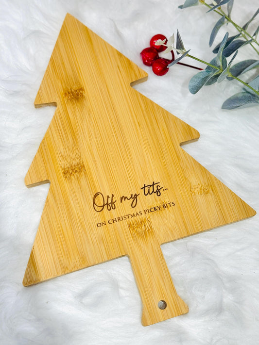 Engraved bamboo christmas tree  shaped serving/ chopping board. Off my tits on picky bits serving board. funny snack - cheese board.